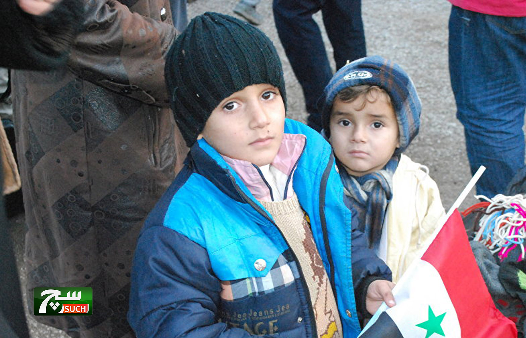 حملة التلقيح السورية تقوم بتطعيم الأطفال الخارجين من الغوطة الشرقية